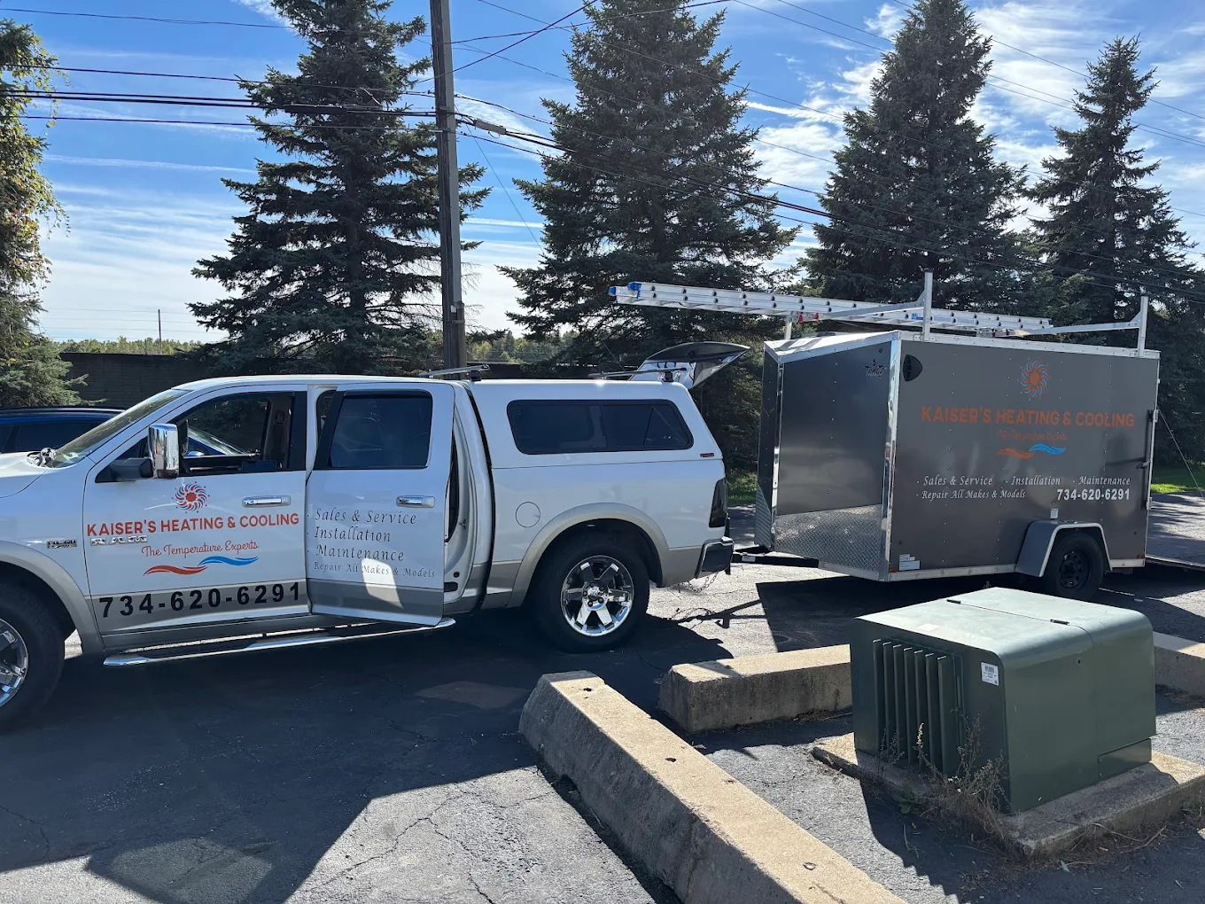 Kaiser's Heating & Cooling owner standing by service van